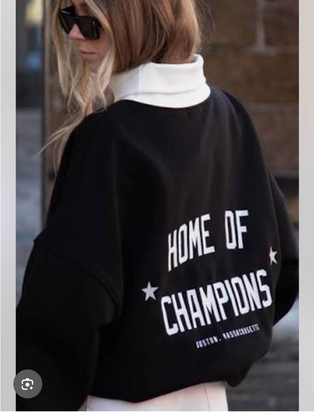 Black Sweatshirt with "Home of Champions" Graphic